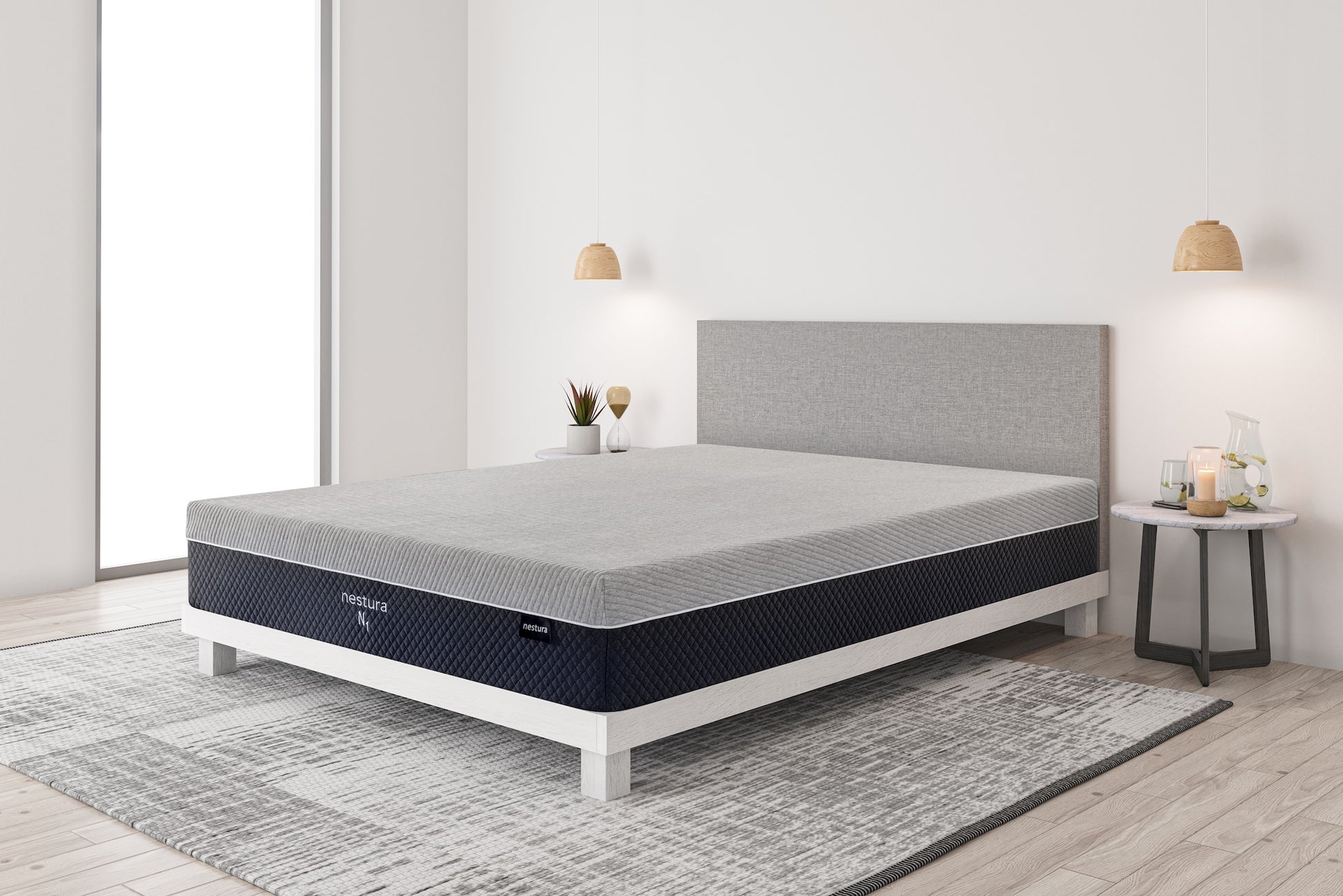Mattress on a bed in a minimalistic bedroom setting