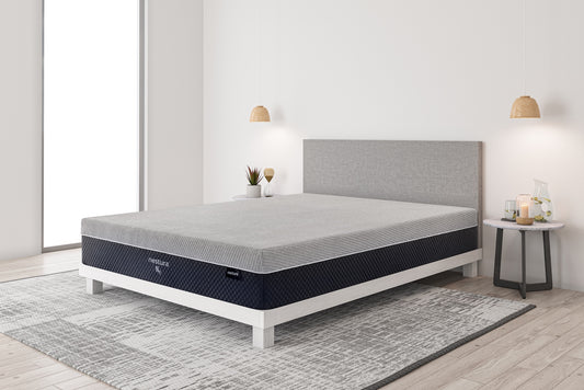 Mattress on a bed in a minimalistic bedroom setting