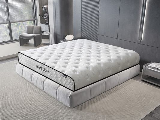 White mattress with 'Night Cloud' branding in a modern bedroom setting.